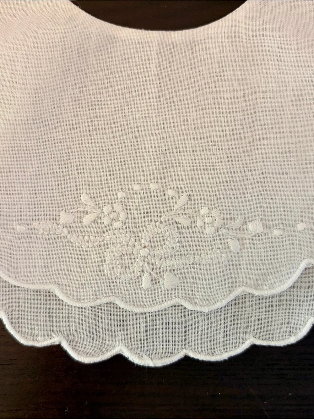 White Scalloped Linen Baby Bib with Embroidered Floral Detail